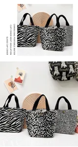 Borsa portagio pranzo in tela con elegante stampa animalier zebrata e leopardata.