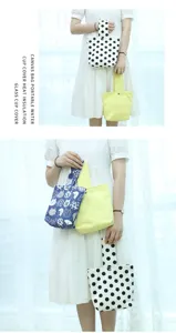 Detailansicht der minimalistischen Canvas Handtasche mit schickem Polka Dot und Mustern.