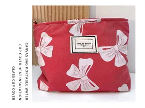 Rote Canvas Kosmetiktasche mit süßem Schleifen-Druck, tragbare Aufbewahrung für Damen.