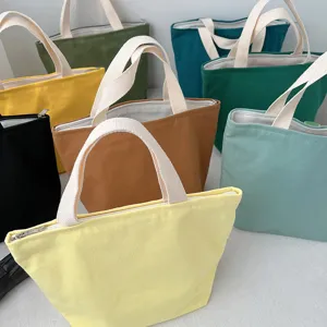 Canvas lunch bag with zipper and sturdy handles, multi-color bento tote for daily use.