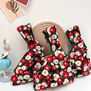 Japanese style floral knot bag detail, cute cat pattern cotton wrist pouch for daily use.
