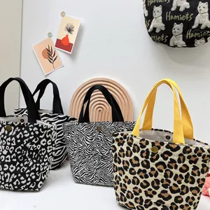 Comoda borsa da pranzo in tela da donna, tote portatile con stampa leopardata e zebrata.
