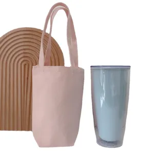 Tragbare Canvas Tassenhülle mit Becher Set, stilvolle rosa Tasche und blauer Isolierbecher Alltag.