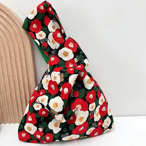 Japanese style fabric knot wrist bag detail, floral print small handbag, portable casual pouch.