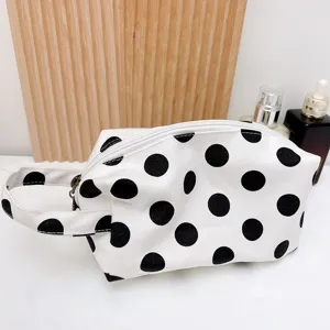 Bolsa cosmetica de lona blanca con lunares negros, bolsa de viaje portatil con cremallera util.