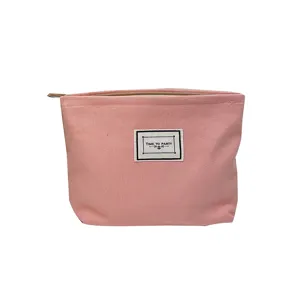 Semplice borsa cosmetica in tela color caramella, pochette da viaggio portatile con cerniera.