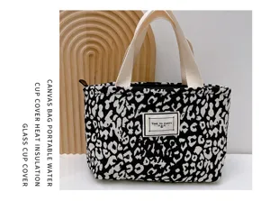 Bolso tote de lona en blanco y negro estilo coreano con cremallera para uso diario y casual.