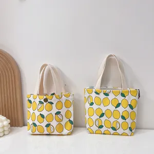 Bonito bolso de lona con estampado de limón y asas resistentes para el uso diario.
