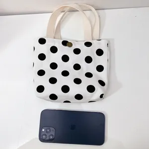 Cute polka dot canvas handbag for women, casual student tote bag with snap button for daily use.