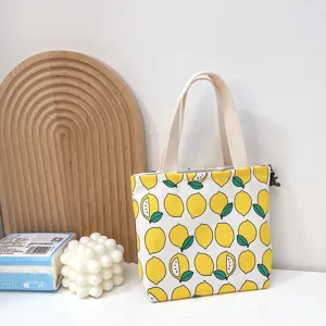 Linda bolsa tote de lona con estampado de limón y cremallera, pequeño bolso de mano diario.