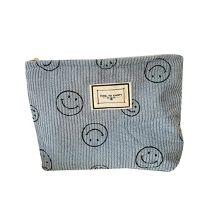 Niedliche Kosmetiktasche aus Kord mit Smiley-Gesicht und Reißverschluss für die tägliche Nutzung.