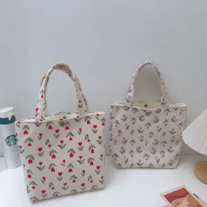 Corduroy tote bag with tulip floral print, casual aesthetic handbag for daily commute.