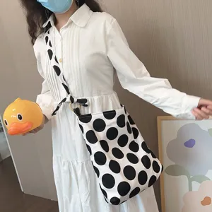 Large capacity polka dot canvas shoulder bag for women, adjustable strap casual crossbody bag.