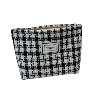 Black and white tweed plaid cosmetic bag large capacity makeup pouch fashion clutch handbag.
