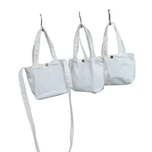 Minimalistische effen witte canvas schoudertas en mini tote set, veelzijdige casual dagelijkse tas.