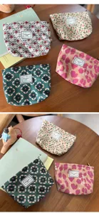 Corduroy cosmetic bag with zipper closure, floral and geometric prints, ideal for daily storage.