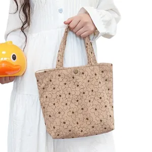 Beige Kord Handtasche mit braunem Blumenmuster, große retro Tragetasche für Damen und Alltag.
