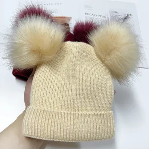 Cozy double pom-pom knitted beanie hat for women and kids winter warmth cute style stylish accessory