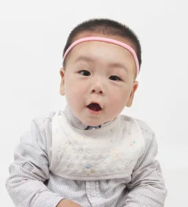 Baby pink elastic headband seamless hair accessory for infant toddlers comfortable daily wear.