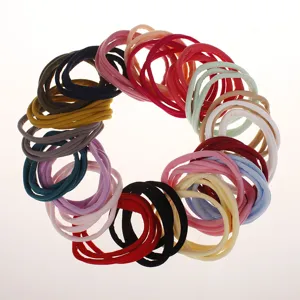 Close-up detail shot of colorful elastic nylon hair ties, soft stretchy texture for daily wear.