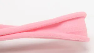 Soft pink elastic nylon headband material detail close-up showing texture quality and stretch.