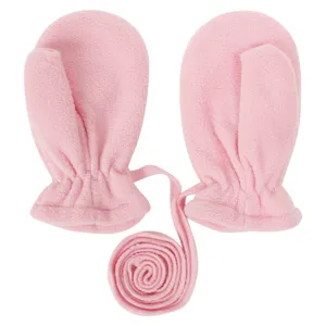Pink fleece baby mittens detail, soft texture and neck string for winter cold protection.