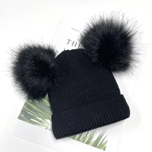 Black double pom pom knit beanie winter warm cozy cute fluffy hat stylish detail view