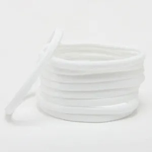 Detailed close-up of white seamless elastic hair ties, soft stretchy material for baby headbands.