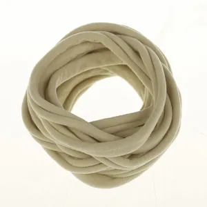 Detailed close-up view of soft elastic nylon hair bands for DIY baby headwear accessories.