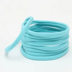 Light blue seamless elastic hair band, soft baby headband DIY accessory, hair-friendly.