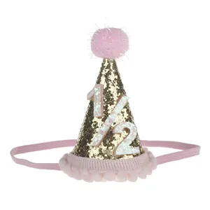 Dettaglio cappello festa compleanno metà anno glitter oro, pompon rosa e fascia elastica.