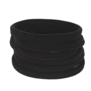 Close-up detail of black nylon hair elastics, soft high elasticity bands, daily hair accessory