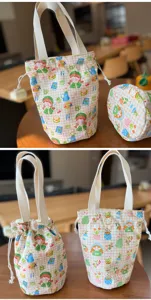 Leinwand Kordelzug Tasche Detail mit süßem Cartoon-Druck, tragbare Pendler Henkeltasche.