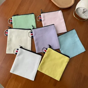 Colorful canvas coin purse with zipper and portable metal ring for travel daily storage use.