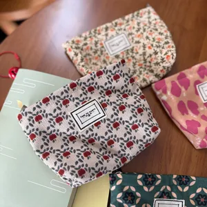 Corduroy cosmetic bag portable small makeup pouch cute floral zipper toiletry storage bag.