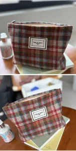 Detailed view of autumn winter plaid woolen cosmetic bag toiletry storage pouch for daily use.