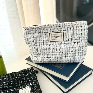 Tweed cosmetic bag large capacity portable makeup pouch stylish zipper toiletry organizer.