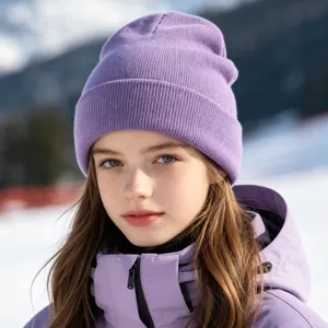 Detail view of a cozy purple knitted beanie hat, perfect for outdoor winter warmth and daily wear.