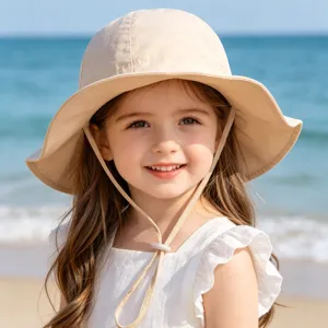 Kids sun protection bucket hat with adjustable chin strap, solid color outdoor beach hat.