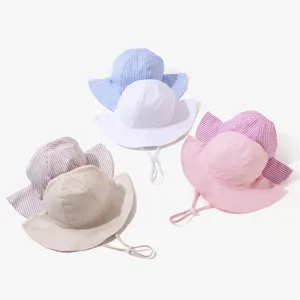 Children's sun hat detail view, adjustable strap, multi-color striped and solid options.