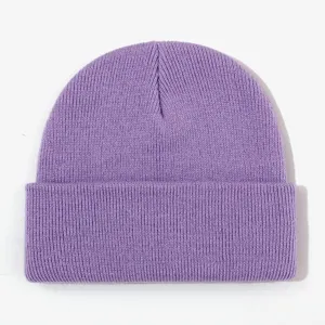 Detailed view of the purple knitted beanie showing fine texture and cozy winter warmth.