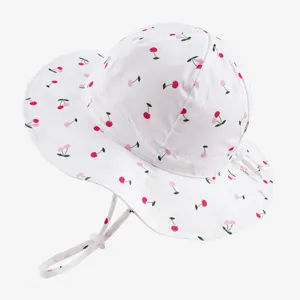 Cute baby sun bucket hat with pink cherry print, breathable cotton, adjustable chin strap.