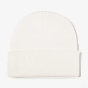 Detailed shot of a soft white knit beanie, perfect cozy winter thermal cap texture.