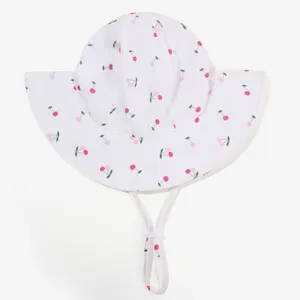Cute baby cherry print sun hat detail showing wide brim and adjustable wind rope.