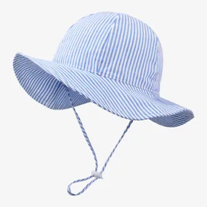 Kids blue white striped sun hat detail showing adjustable chin strap and wide brim design.