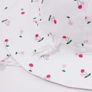 White baby bucket hat with cute pink cherry print and adjustable drawstring cord lock.