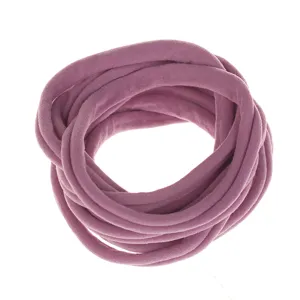 Elastic nylon hair band accessory for baby DIY crafts, soft mauve headband detail shot.