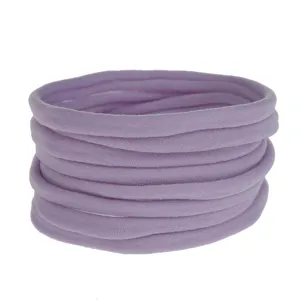 Soft elastic nylon hair bands detail shot, stretchable baby headwear accessory for diy craft.