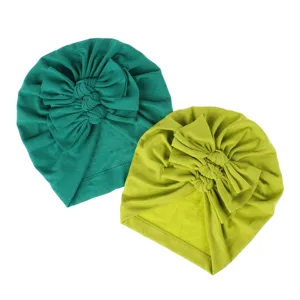 Soft knitted baby turban hat with bow, cute pleated infant cap for spring and summer daily wear.