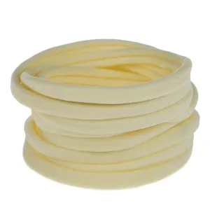 Detailed view of elastic nylon hair ties in light yellow, perfect for DIY children headbands.